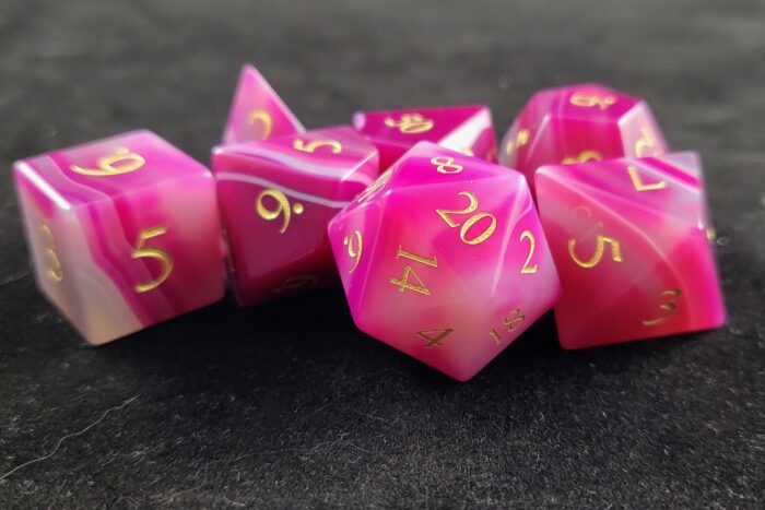 Close-up of Gemstone Polyhedral Dice Set, Pink/White/Grey Colors